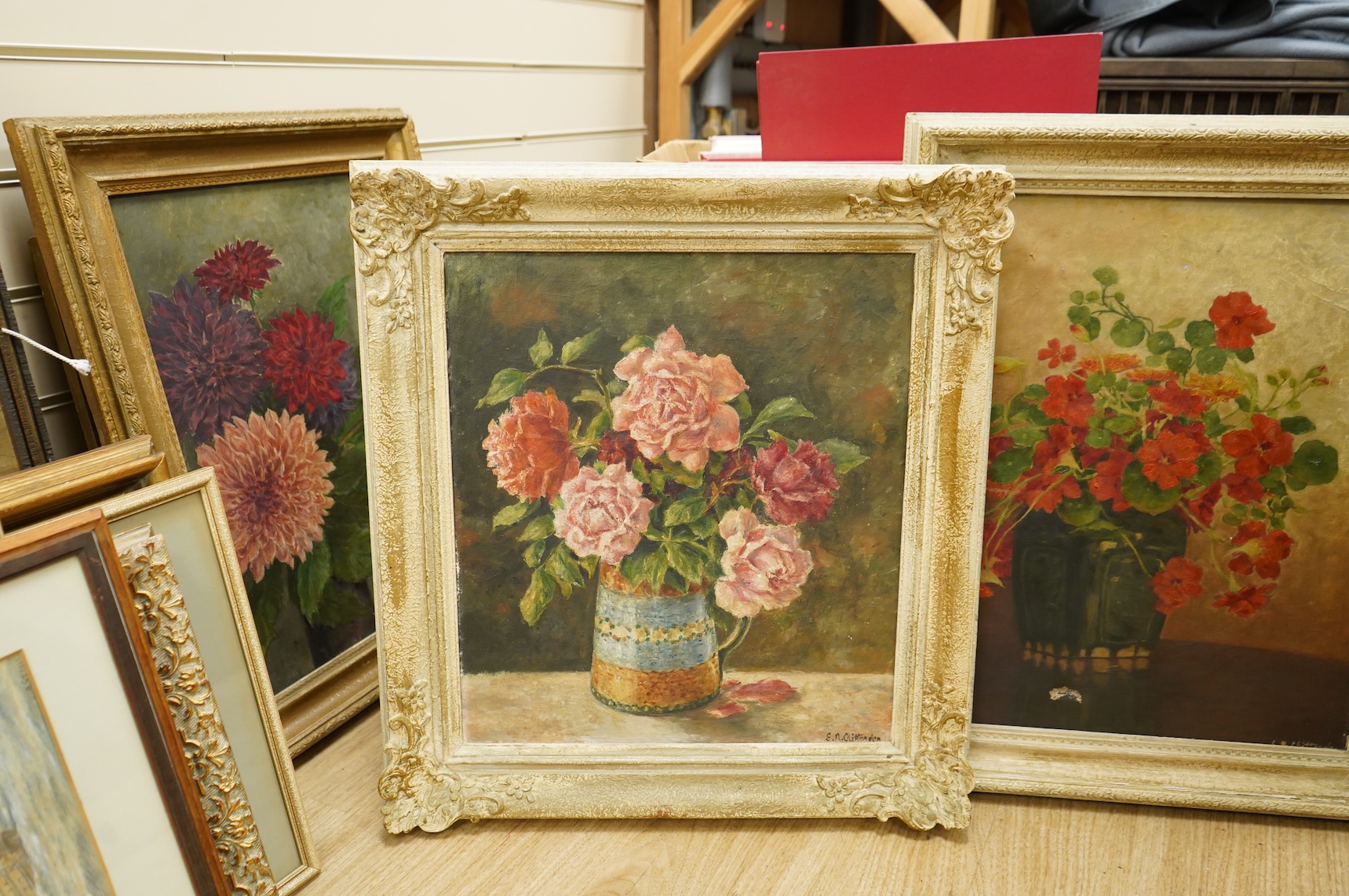 20th century, four still life’s of flowers, each indistinctly signed, oils on canvas, 39 x 34cm